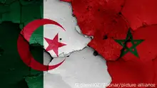 flags of Algeria and Morocco painted on cracked wall