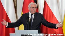 German President Frank-Walter Steinmeier, gestures at a news conference during his meeting with Polish President Andrzej Duda in Warsaw, Poland, Tuesday, April 12, 2022. (AP Photo/Czarek Sokolowski)