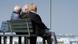 Three pensioners sitting on a bench Three pensioners sitting on a bench