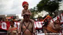 Munduruku Indigenous people march to protest against Brazil's President Jair Bolsonaro and for land demarcation and increase of goldmining in indigenous territories in Brasilia, Brazil, April 11, 2022. REUTERS/Amanda Perobelli