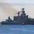 Kapal Moskva berlayar kembali ke pelabuhan setelah melacak kapal perang NATO di Laut Hitam, di pelabuhan Sevastopol, Krimea, 16 November 2021.