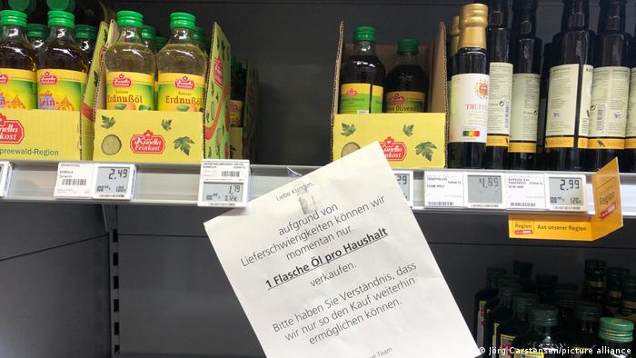 Sunflower oil bottles are seen at a supermarket in Germany