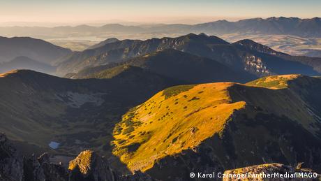 Light shines on the Tatra mountains.