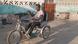 DW Akademie | Local salesman Daniel Apuyine receives a new tricycle in Northern Ghana