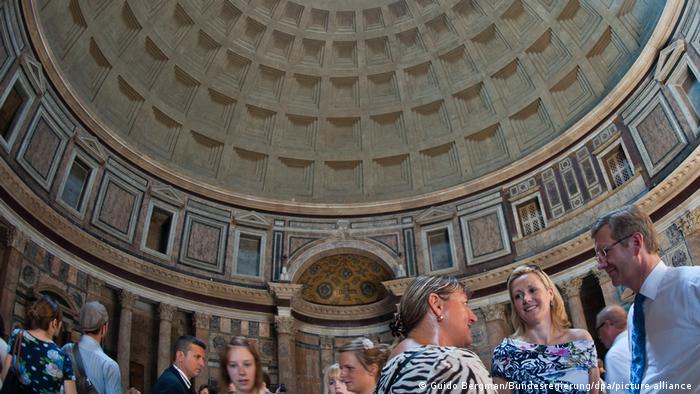 People gather under the Pantheon's dome.