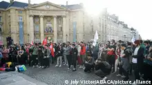 Students gather in front of the Sorbonne University in Paris, France on April 14, 2022, as they stage a protest ten days ahead of the second round of France's presidential election. Several hundred students mobilised in Paris and Nancy, blocking university buildings to make their voices heard between the two rounds of the presidential election and to raise awareness of ecological and social issues. Photo by Victor Joly/ABACAPRESS.COM