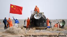 (220416) -- DONGFENG LANDING SITE, April 16, 2022 (Xinhua) -- The return capsule of the Shenzhou-13 manned spaceship lands successfully at the Dongfeng landing site in north China's Inner Mongolia Autonomous Region, April 16, 2022. (Xinhua/Peng Yuan)