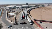 12.04.2022
FILE - A long line of trucks is seeing stalled at the Zaragoza International Bridge, one of two ports of entry in Ciudad Juarez going into the U.S.on April 12, 2022. The truckers blocked both north and south bound commercial lanes in protest after they have seen prolonged processing times implemented by Gov. Greg Abbott. His decision to impose additional inspections of trucks entering Texas from Mexico is Abbott's latest move in an unprecedented foray into border security, which has long been the federal government's domain. (Omar Ornelas/The El Paso Times via AP, File)