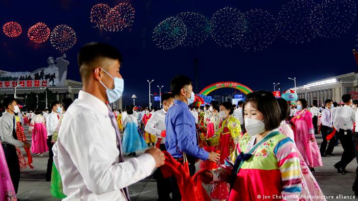 Fireworks launched into the night sky. (AP Photo/Jon Chol Jin)