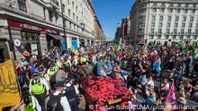 April 16, 2022, London, England, United Kingdom: Extinction Rebellion activists block Marble Arch junction with a limousine and sitting protest. (Credit Image: Â© Tayfun Salci/ZUMA Press Wire
