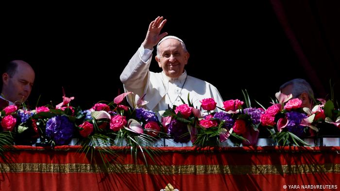 Pope Francis waving during his 'Urbi et Orbi' message