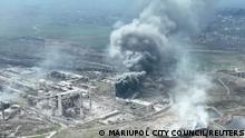 Smoke rises above Azovstal steelworks, in Mariupol, Ukraine, in this still image obtained from a recent drone video posted on social media. MARIUPOL CITY COUNCIL/via REUTERS THIS IMAGE HAS BEEN SUPPLIED BY A THIRD PARTY. MANDATORY CREDIT. NO RESALES. NO ARCHIVES.