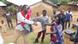 A man is seen delivering humanitarian aid to a girl in the town of Jinka. A man is seen delivering humanitarian aid to a girl in the town of Jinka.