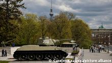 Two T34 tanks Brandenburg Gate and TV tower in the background