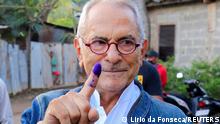 East Timor presidential candidate Jose Ramos Horta shows his inked finger after casting his ballot during the second round of East Timor's presidential election in Dili, East Timor, April 19, 2022. REUTERS/Lirio da Fonseca