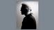 A black and white photo showing the side profile of designer Karl Lagerfeld A black and white photo showing the side profile of designer Karl Lagerfeld