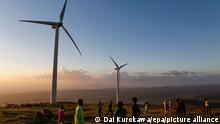 epa05688549 Kenyan children play near the wind turbines of the Ngong Power Station as the sun sets over Ngong Hills in Ngong, in the outskirts of the capital Nairobi, Kenya, 25 December 2016.(issued 26 December) Kenya's power distributor Kenya Power said in November 2016 that the price of electricity will go down in coming months as the company shifts towards more cost-effective sources such as geothermal, solar and wind. One example of such source is the Lake Turkana Wind Power Project in northern Kenya, which is the single largest private investment in the country's history. When completed in 2017, 365 turbines in Turkana are expected to provide 310 megawatts, or one fifth of Kenya's generating capacity. EPA/DAI KUROKAWA ++