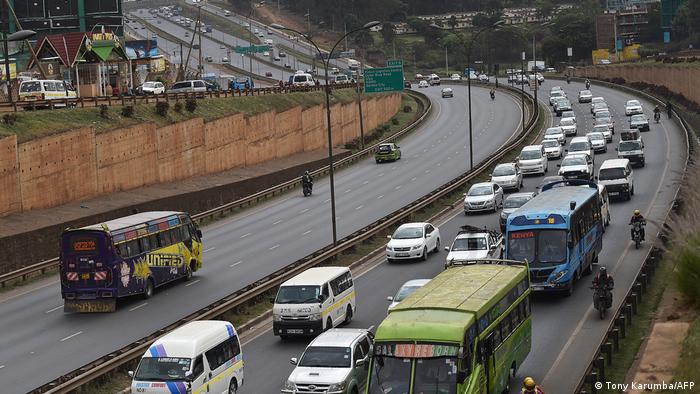 Cars drive down a section of the Thika Superhighway