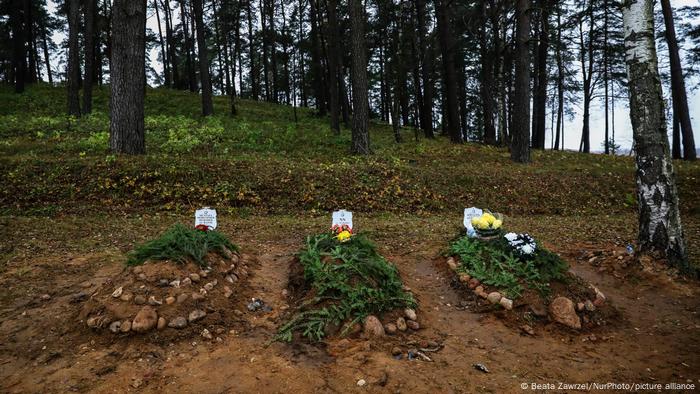 Three graves of the Middle East victims of the migration crisis that was buried on Muslim cemetery in Bohoniki, Poland.