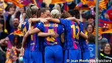 Teammates celebrate after Barcelona's Aitana Bonmati scored the opening goal during the Women's Champions League semifinal, first leg soccer match between Barcelona and Wolfsburg at Camp Nou stadium in Barcelona, Spain, Friday, April 22, 2022. (AP Photo/Joan Monfort)