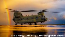 October 6, 2020 - Katterbach, Bayern, Germany - A CH-47 Chinook from B Co 'Big Windy' 1-214th General Support Aviation Battalion spins up for an evening training flight just after a storm clears on Oct. 6 at Katterbach Army Airfield. (Credit Image: © U.S. Army/ZUMA Wire/ZUMAPRESS.com