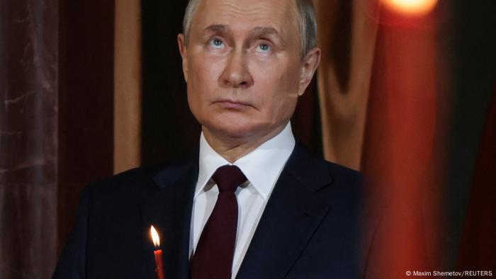 Russian President Vladimir Putin looking up