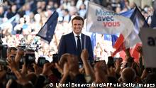22.4.2022, Figeac****TOPSHOT - French President and centrist La Republique en Marche (LREM) party candidate for re-election Emmanuel Macron reacts with as he holds a rally on the last day of campaigning, in Figeac, southern France, on April 22, 2022, ahead of the second round of France's presidential election. - Macron faces the French far-right Rassemblement National (RN) party candidate in a run-off vote on April 24, 2022. (Photo by Lionel BONAVENTURE / AFP) (Photo by LIONEL BONAVENTURE/AFP via Getty Images)