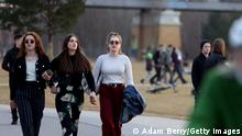 BERLIN, GERMANY - MARCH 11: Pedestrians walk through a park as a woman cycles by on March 11, 2018 in Berlin, Germany. A high temperature of 16 degrees Celsius (61 degrees Fahrenheit) brought residents and tourists outside to enjoy the first day of spring weather of the year. (Photo by Adam Berry/Getty Images)