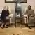 Svenja Schulze and Monique Nsanzabaganw, two women seated in armchairs, a small table between them