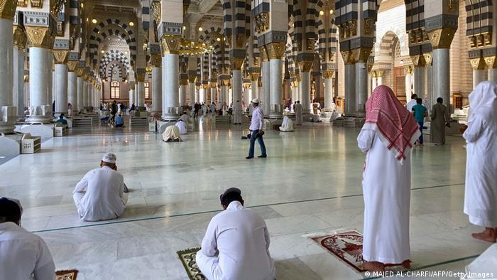 Muslim worshippers perform noon prayer at the Prophet Mohammed's mosque in Saudi Arabia's holy city of Medina, Islam's second holiest city.