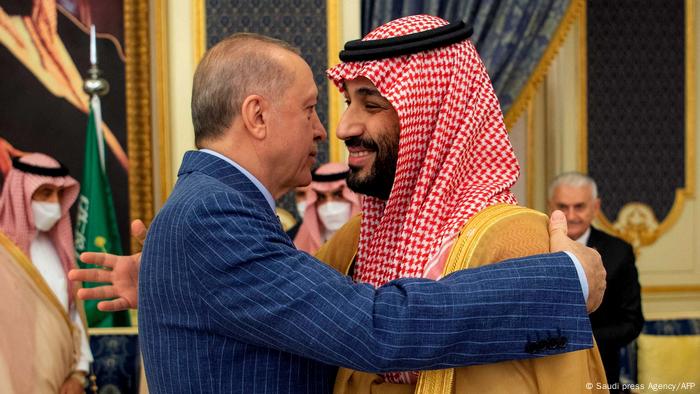 Turkish President Tayyip Erdogan hugs Saudi Crown Prince Mohammed bin Salman