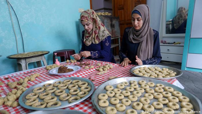 Women bake cookies in Gaza