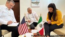 29.04.2022
Mexico's President Andres Manuel Lopez Obrador, next to Mexico's foreign minister Marcelo Ebrard, is pictured during a call with U.S. President Joe Biden, where they discussed investments in Central America to curb migration from the region, in Isla Mujeres, Quintana Roo state, Mexico, in this picture delivered to Reuters April 29, 2022. Mexico's Presidency/Handout via REUTERS ATTENTION EDITORS - THIS IMAGE HAS BEEN SUPPLIED BY A THIRD PARTY. IT IS DISTRIBUTED, EXACTLY AS RECEIVED BY REUTERS, AS A SERVICE TO CLIENTS. NO RESALES. NO ARCHIVES
