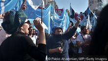 Members of different social organizations take part in the May Day (Labour Day) rally in Buenos Aires, on May 1, 2022. (Photo by PABLO AHARONIAN / AFP) (Photo by PABLO AHARONIAN/AFP via Getty Images)