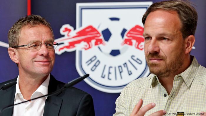 Ralf Rangnick and Alexander Zorniger in front of the RB Leipzig logo at a press conference