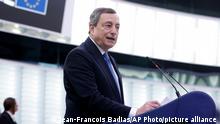 Italian Prime Minister Mario Draghi delivers his speech Tuesday, May 3, 2022 at the European Parliament in Strasbourg, eastern France. (AP Photo/Jean-Francois Badias)