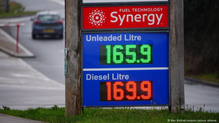 Fuel prices displayed at an Esso petrol station near Cardiff,.