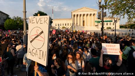 Demonstrators protest outside of the US Supreme Court 