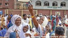 LAGOS, NIGERIA - MAY 2: Nigerians take a photo in their traditional clothes during Eid al-Fitr prayers in Lagos, Nigeria on May 2, 2022. Muslims gather to perform Eid al-Fitr prayers held in Nigeria, the country with the largest Muslim population in Africa. Adeyinka Yusuf / Anadolu Agency