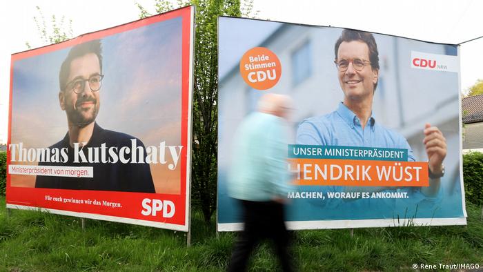 election posters showing Thomas Kutschaty and Hendrik Wüst