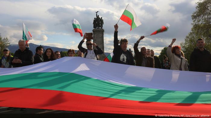 Supporters of the pro-Russian Vazrazhdane party waving Bulgarian flags