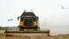 A combine harvester in a field in Zaporizhzhia Region, southeastern Ukraine A combine harvester in a field in Zaporizhzhia Region, southeastern Ukraine