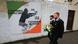 People walk pass a IRA mural in the Bogside area of Londonderry, Northern Ireland, 23 March 2017 People walk pass a IRA mural in the Bogside area of Londonderry, Northern Ireland, 23 March 2017