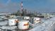 An aerial view of an oil tank battery at the Novokuibyshevsk Refinery, a subsidiary of Rosneft Oil Company, in the city of Novokuibyshevsk 20 km southwest of Samara. An aerial view of an oil tank battery at the Novokuibyshevsk Refinery, a subsidiary of Rosneft Oil Company, in the city of Novokuibyshevsk 20 km southwest of Samara.