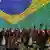 Former Brazilian President Luiz Inacio Lula da Silva celebrates the launch of his campaign for Brazil's October presidential election in Sao Paulo