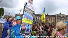 Путіна - до суду: антивоєнні акції в містах Німеччини 8 травня