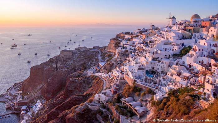 View of the town of Oia in the sunset, Santorini, Greece
