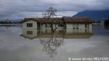 A home is reflected in floodwaters in the Yarrow neighbourhood after rainstorms caused flooding and landslides in Chilliwack, British Columbia, Canada November 20, 2021. REUTERS/Jesse Winter Pulitzer Prize finalist for Feature Photography