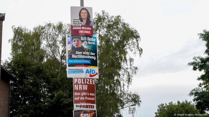 Campaign placards from some of the smaller parties: from top to bottom the Left party, the far-right Alternative for Germany (AfD) and the satirical party called The Party