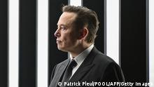Tesla CEO Elon Musk is pictured as he attends the start of the production at Tesla's Gigafactory on March 22, 2022 in Gruenheide, southeast of Berlin. - US electric car pioneer Tesla received the go-ahead for its gigafactory in Germany on March 4, 2022, paving the way for production to begin shortly after an approval process dogged by delays and setbacks. (Photo by Patrick Pleul / POOL / AFP) (Photo by PATRICK PLEUL/POOL/AFP via Getty Images)